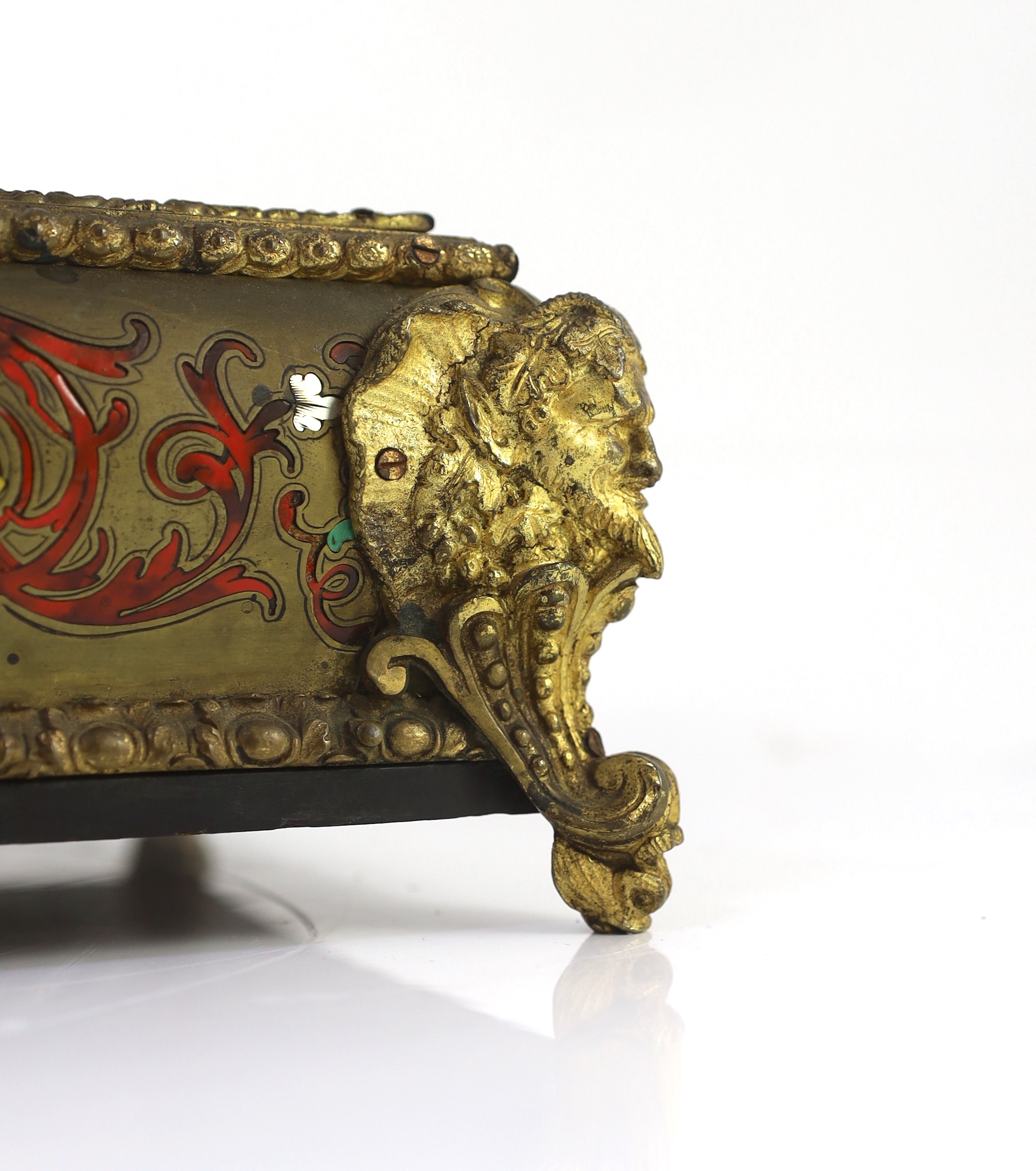 A 19th century French scarlet Boulle work desk stand with ormolu mounts, 36cm wide